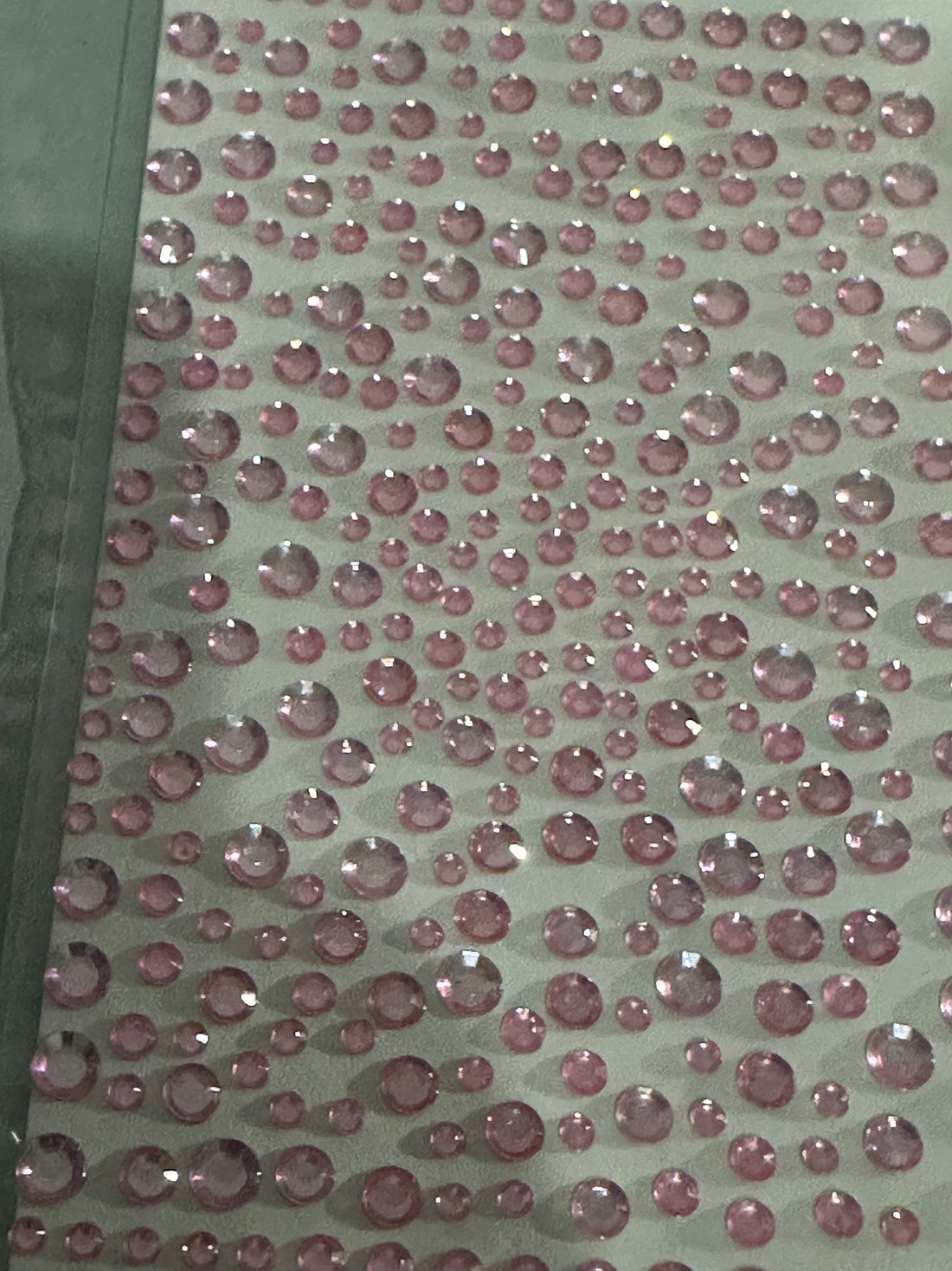 pink rhinestone stickers. Looks dazzling on your face.