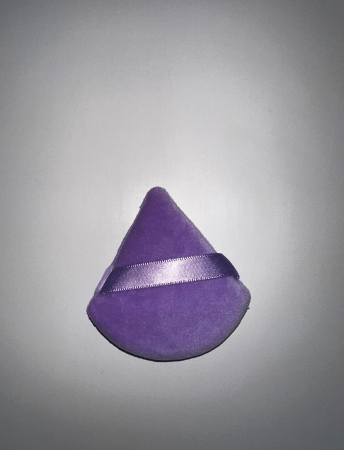 Triangular powder puffs