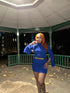 LMini red dress with slits on sleeves, with gold belt.