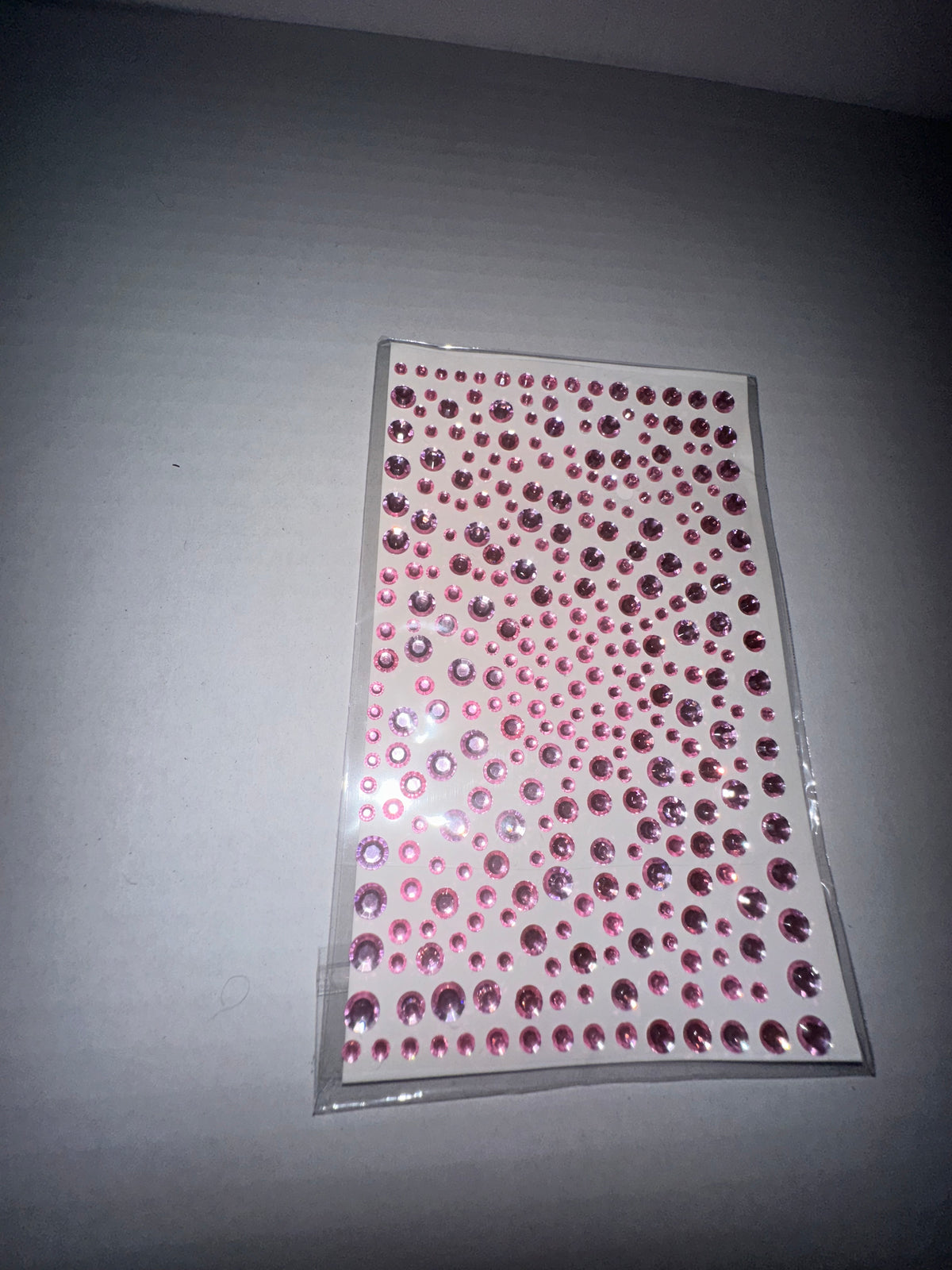pink rhinestone stickers. Looks dazzling on your face.