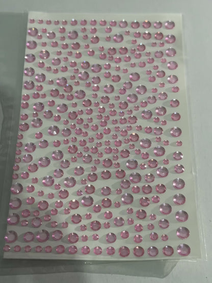 pink rhinestone stickers. Looks dazzling on your face.